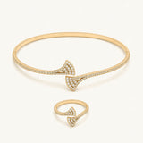 سوار القضبان المرصّع من واحة — سوار وخاتم ذهبيان بتصميم المروحة